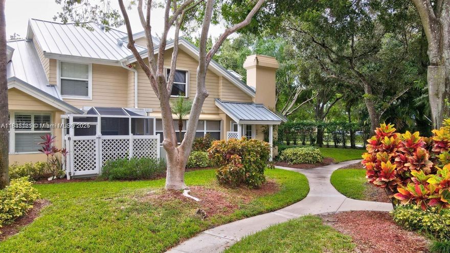 Beautifully updated townhouse for sale in the only community in the Meadows with a 24/7 manned gated entrance. This home comes with a brand new A/C, dishwasher, and screen enclosure with hard roof (w/permit). A digital keypad, nest thermostat, ring doorbell system, and a 75" Sony TV are all included. Metal roof and accordion shutters on the entire home provide safety and optimal insurance savings. Enjoy the fully renovated kitchen with matching GE appliances and soft close cabinetry. The two assigned parking spaces are adjacent to the walkway leading to your front door. A stunning White Oak glass staircase compliments the vaulted ceilings at the center of the home and the impressive built-in closet in the upstairs bedroom adds to the surplus of storage throughout the home. FHA approved.