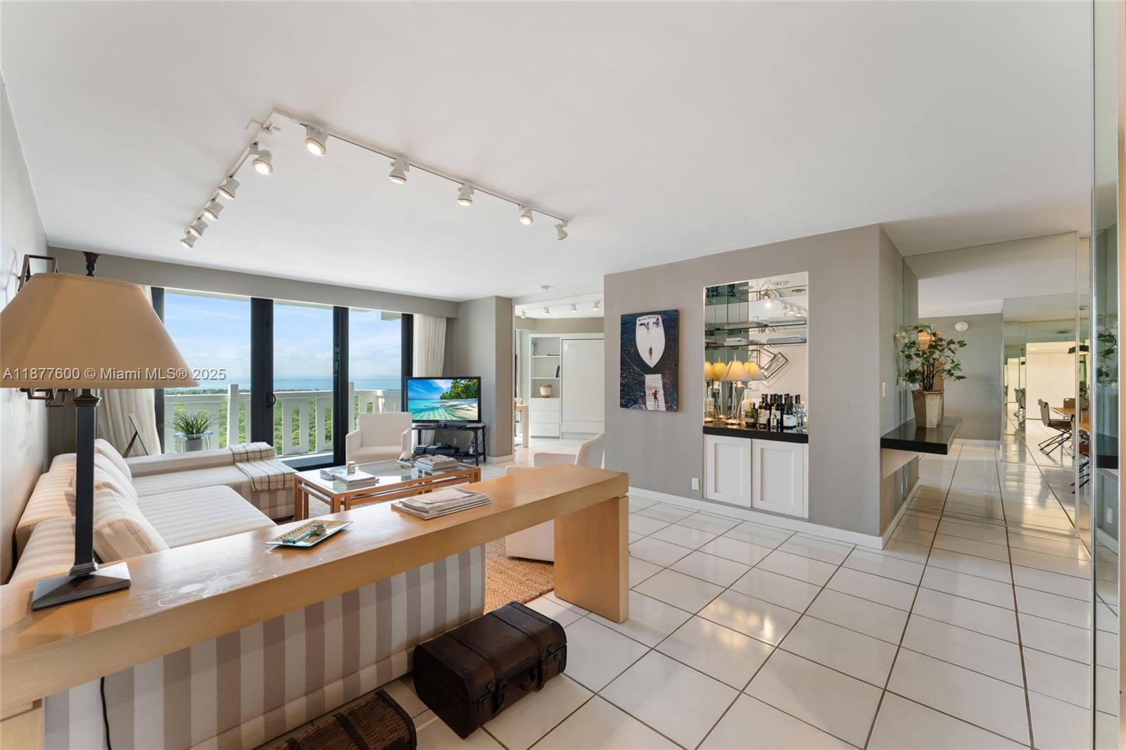 1 Year Rental | Furnished | Ocean View | Key Biscayne.
2 Bed 2 Bath with 2 parking spaces, beautifully furnished and tastefully decorated, offering the perfect blend of comfort, style, and resort-style living. Located in a gated community with direct beach access, steps from Bill Baggs State Park and the ocean, with breathtaking, unobstructed views. The spacious master bedroom includes a walk-in closet and en-suite bath with large shower and double sinks, while the second bedroom features two Murphy beds for versatility. Amenities include beach service with chairs and umbrellas, gym, children’s playroom, tennis courts, BBQ area, on-site restaurant, and beauty salon. Easy to show. Please see broker remarks.