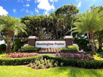 Welcome home! Condo features 2 beds, 2 baths, lake view, full washer/dryer, family room, den and enclosed balcony with large lake view. Huntington Pointe is an incredible 55+ community with tons of amenities! Newly renovated clubhouse features card rooms, billiards room, ceramics room with kilns, state-of-the-art gym and fitness studio, locker rooms have showers, sauna & steam rooms. Professionally-equipped theater seats over 600 people for concerts, shows, movies and more! Main swimming pool with hot tub and heated indoor pool at clubhouse plus 3 heated satellite pools. Tennis, pickleball, bocce, corn hole, basketball, and shuffleboard. The cafe is open daily from 8 am - 3 pm for breakfast and lunch. Eat in, take out or deliver! One-time Community Contribution of $3,500 due at closing.