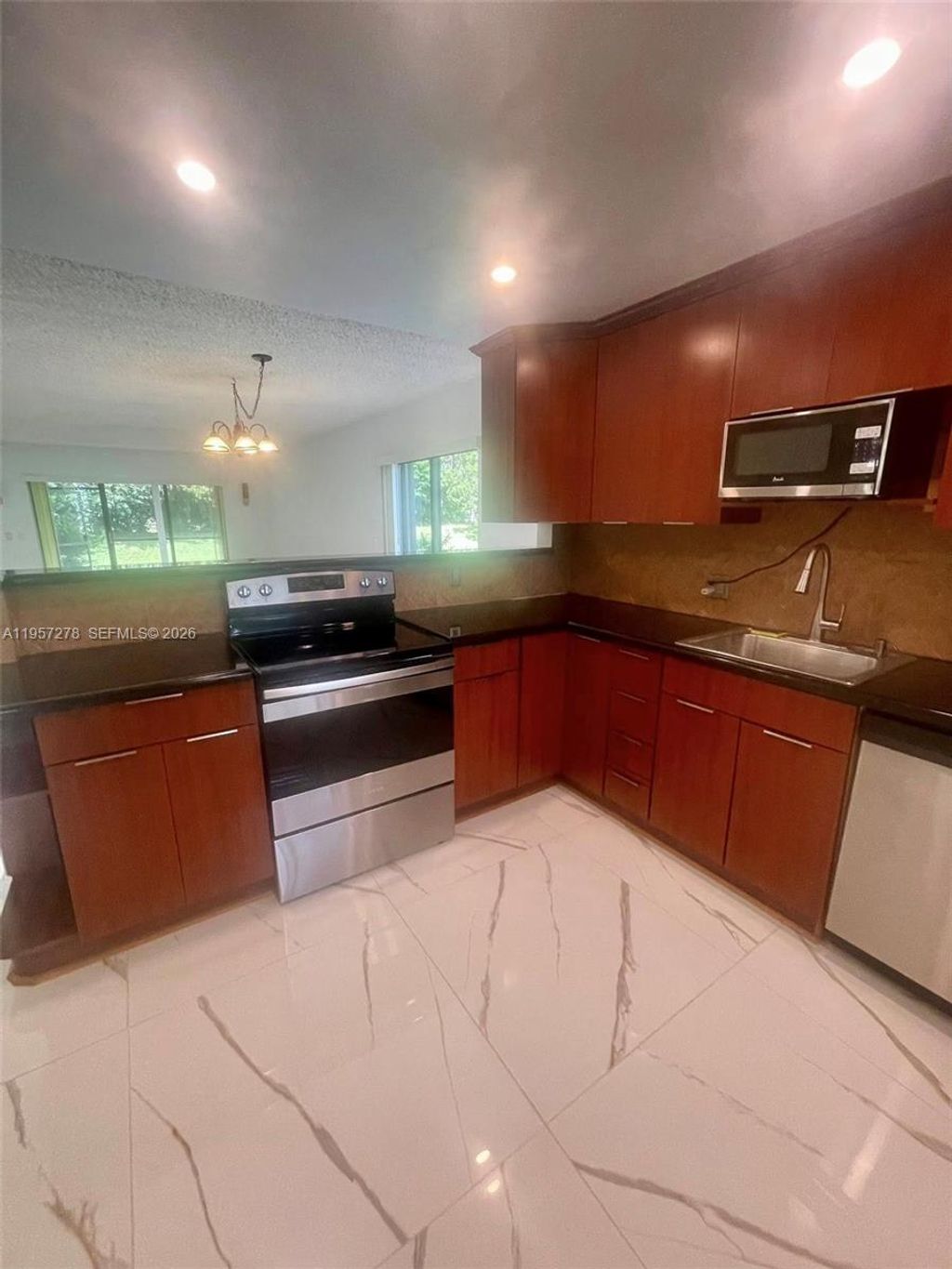 Photo of 403 Lakeview Dr #106, Weston, FL 33326 (MLS # A11957278)