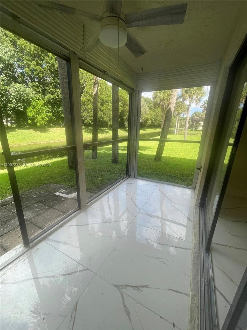 Photo of 403 Lakeview Dr #106, Weston, FL 33326 (MLS # A11957278)