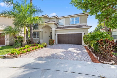 Photo of 16745 NW 12th Ct, Pembroke Pines, FL 33028 (MLS # A12062675)