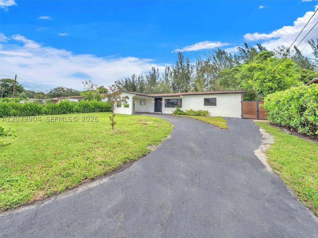 Photo of 5450 SW 55th Ave, Davie, FL 33314 (MLS # A12073904)