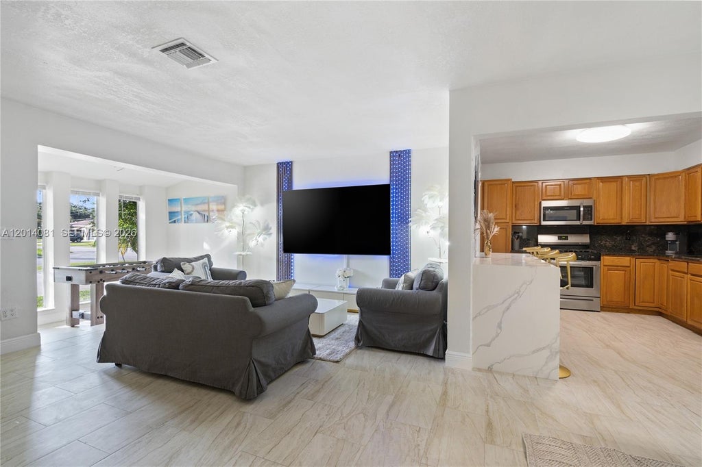 Photo of 2125 N 14th Ct, Hollywood, FL 33020 (MLS # A12014081)