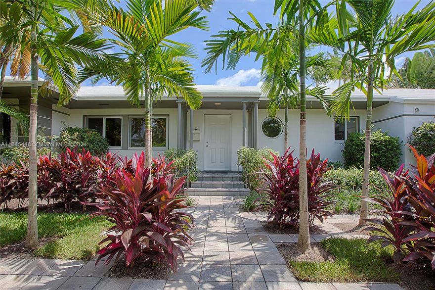Located in one of Miami Beach’s most coveted neighborhoods, this property offers a rare opportunity to create your dream home in a quiet, picturesque setting. Nestled within the exclusive Venetian Islands, this home features an open-concept layout where the kitchen blends seamlessly into the living areas, offering great potential for modern redesign. The current kitchen includes stainless steel appliances & sleek finishes, while wood floors run throughout the home, leading to custom-built closets. Natural light floods the interior through impact windows, enhancing the home's bright & airy feel. Step outside to a lush tropical retreat with a heated pool ideal for both entertaining & relaxing. This property is a prime renovation opportunity in one of Miami Beach’s most desirable locations.