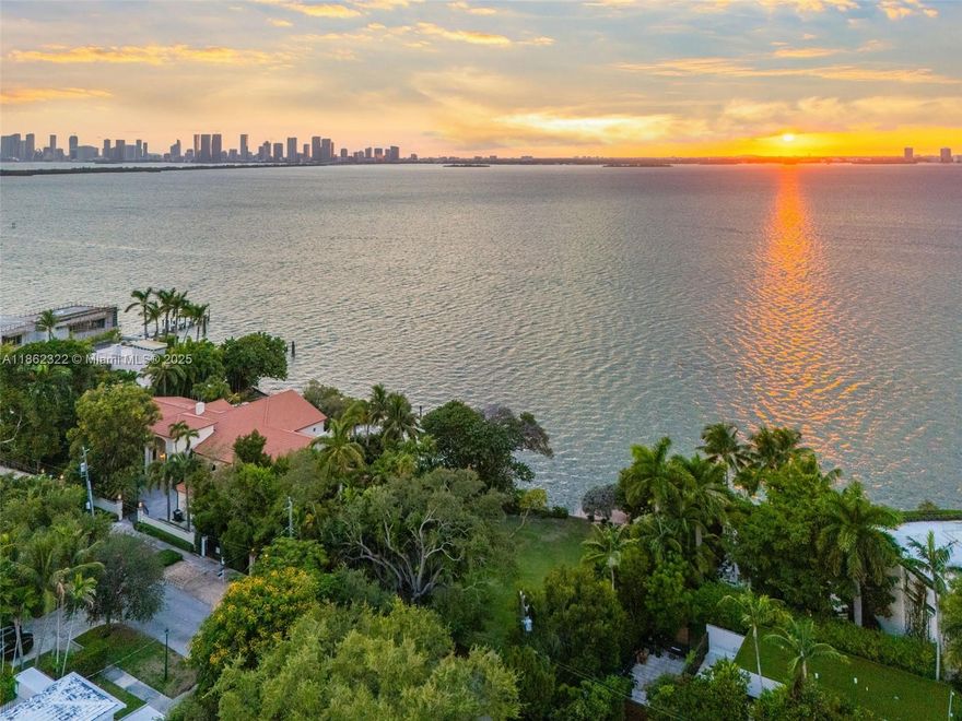 A wide bayfront Pied-à-Terre on the most expensive enclave in Miami Beach, North Bay Road! This enchanting Italian villa is sited on lushly landscaped lot offering 62 feet of waterfrontage with dreamy sunset views over Biscayne Bay and the Miami skyline! Secluded, hand laid pebble-stone courtyard leads inside the home where original details, dramatic arched doorways, and serene views of blue waters capture your attention. The living room is embraced by soaring, cypress wood-beamed ceilings, keystone fireplace, and Saturnia floors. Kitchen is modernized with direct access to the backyard. Backyard is a secluded tropical paradise equipped with a pool, keystone patio area, huge 40x20 feet dock, and double jet-ski lift. Experience luxury living amidst $20M to $100M+ mansions! Lease $42k/month.