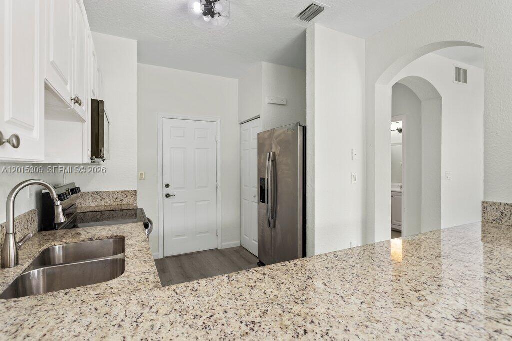 SANTORINI AT VIZCAYA - Residential Lease
