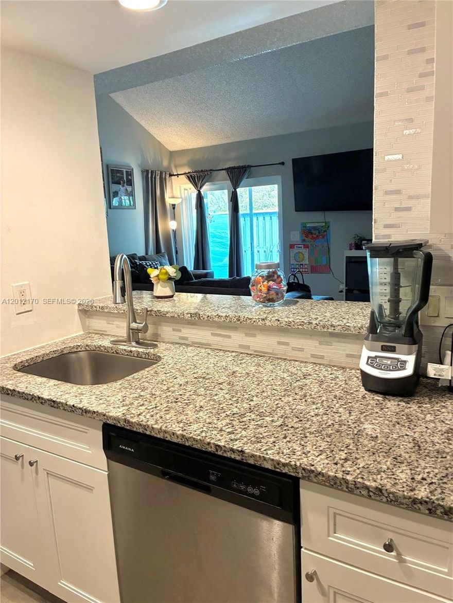 Beautiful and spacious 2-bedroom, 2-bath townhouse located in the heart of North Lauderdale in the highly sought-after Players Place community. This well-maintained and tastefully renovated home features a updated kitchen and tile flooring throughout the first level. The oversized primary suite offers a walk-in closet and en-suite bathroom. This townhouse comes with washer and dryer are located on the second floor. Enjoy a private patio perfect for outdoor relaxation or entertaining. The community amenities include a swimming pool, tennis courts, and more with lush green areas. Ideally situated near major highways, shopping centers, schools, and parks. Fast approval—ready for immediate move-in!