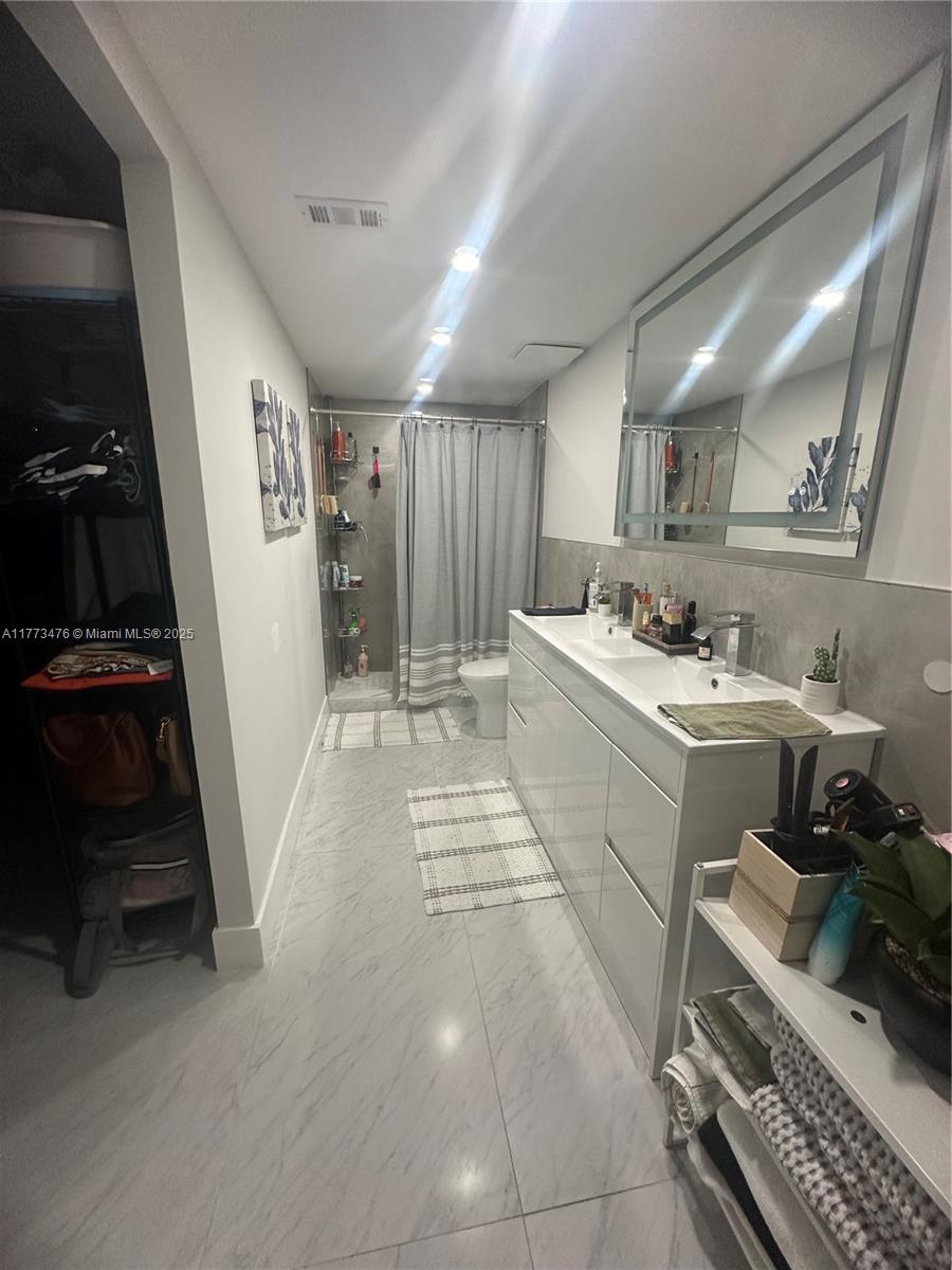 THE VINTAGE CONDO - Residential