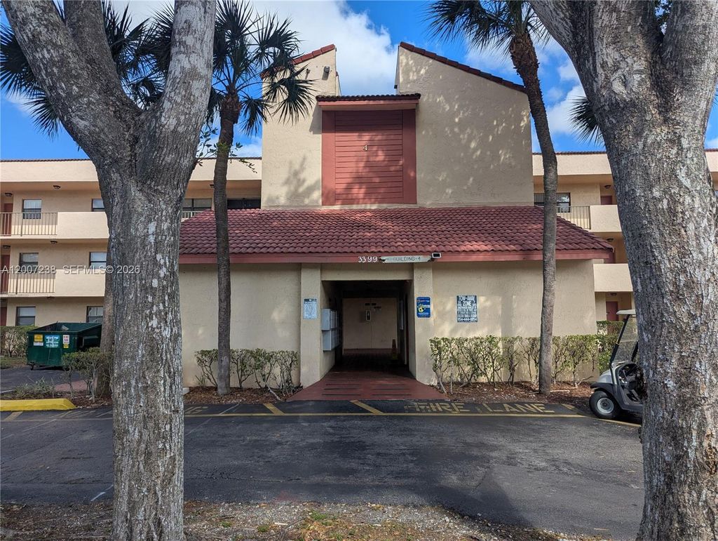 Photo of 3399 Foxcroft Rd #103, Miramar, FL 33025 (MLS # A12007238)