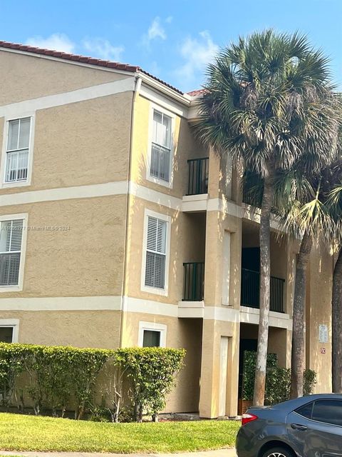 Photo of 733 Riverside Dr #1236, Coral Springs, FL 33071 (MLS # A11606277)
