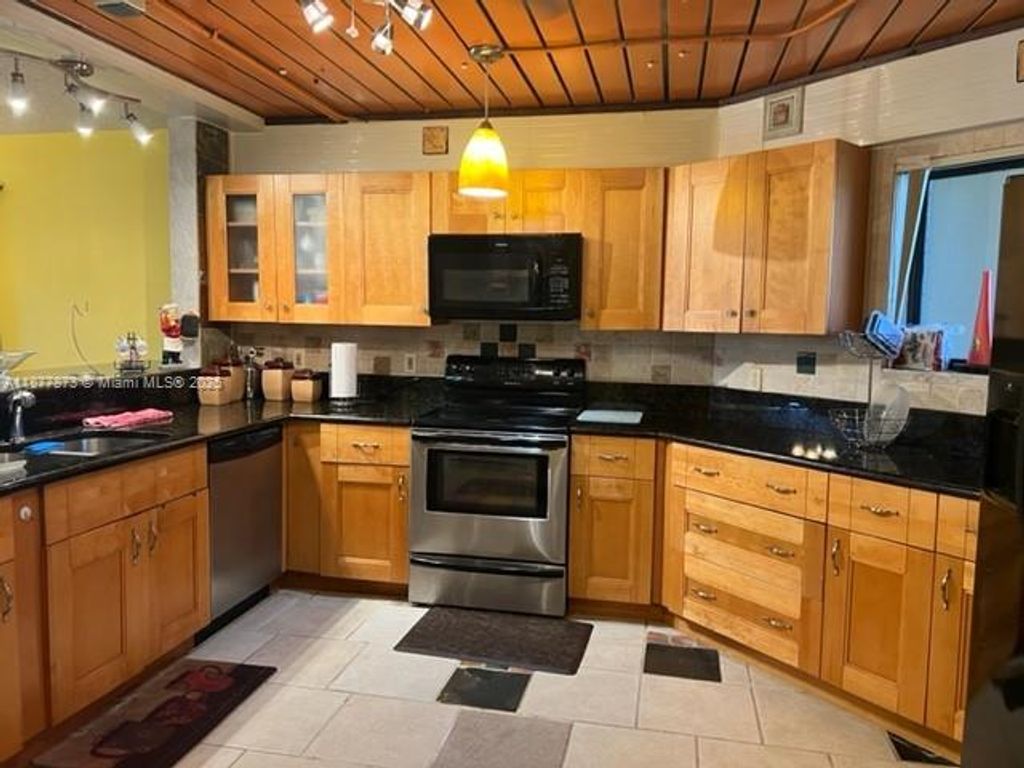 Photo of 600 Uno Lago Dr #302, Juno Beach, FL 33408 (MLS # A11877873)