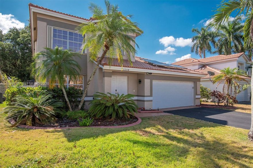 Beautifully maintained 4-bedroom, 2.5-bath pool home in the highly desirable Sawgrass Residences @ The Pointe community of Sunrise! This spacious two-story residence offers over 2,300 sq ft of living space with soaring vaulted ceilings, abundant natural light, and a functional layout perfect for both everyday living and entertaining.
The home features a bright eat-in kitchen with cooking island, pantry, and natural gas range, opening to multiple dining and living areas. Interior highlights include porcelain and laminate flooring, walk-in closets, Roman tub, separate shower, and a convenient laundry/utility room. Step outside to your private screened-in pool and patio, ideal for relaxing or hosting year-round. Additional features include hurricane protection, fenced yard, 2-car garage, and solar panels for added efficiency. Located in a well-kept community steps from Sawgrass Mall and Volunteer Park which is filled with amenities! Easy access to major highways, shopping, dining, and top-rated schools. No HOA approval required!! Don’t miss this opportunity to own a move-in ready home in a prime location.