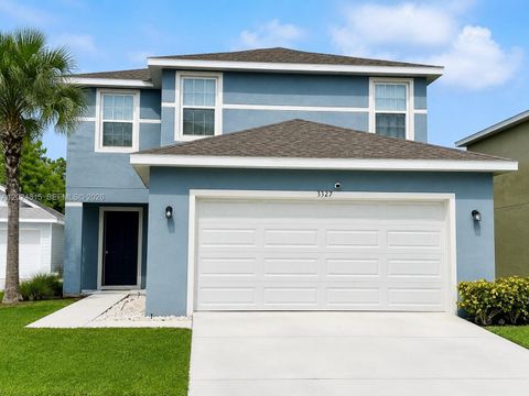Photo of 3327 Columbia Square Way, Fort Pierce, FL 34982 (MLS # A12024315)