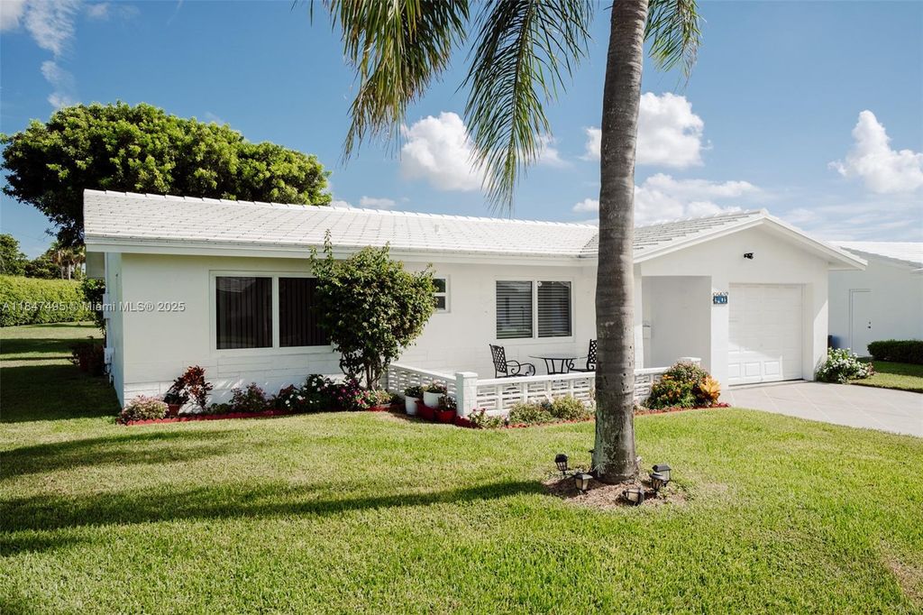 Photo of 2401 SW 11th Ave, Boynton Beach, FL 33426 (MLS # A11847495)