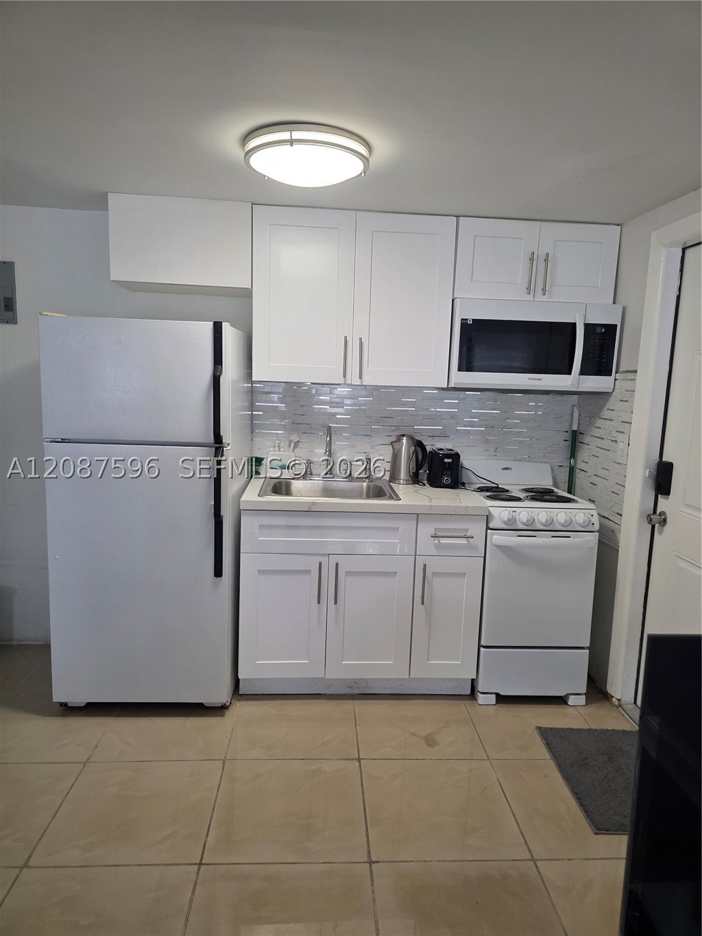 Photo of 5712 Hollywood Blvd #1, Hollywood, FL 33021 (MLS # A12087596)