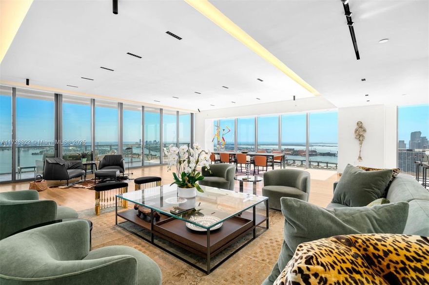 Edgewater’s most exclusive boutique development, featuring just 94 half and full-floor residences. This premier SE corner 3 Bedroom residence offers breathtaking bay and city views from its expansive great room and two private terraces. Designed for luxury, it boasts 10-ft floor-to-ceiling windows, white oak flooring, a Wolf gas range, Sub-Zero appliances, and a private elevator foyer. Smart upgrades include Lutron-controlled Flos lighting, a state-of-the-art surround sound system, automated window shades and acoustic wallpaper. Enjoy world-class amenities, including a Jean-Louis Denoit-designed lobby, Sky Lounge, spa, fitness center, two pools, and five-star concierge services.