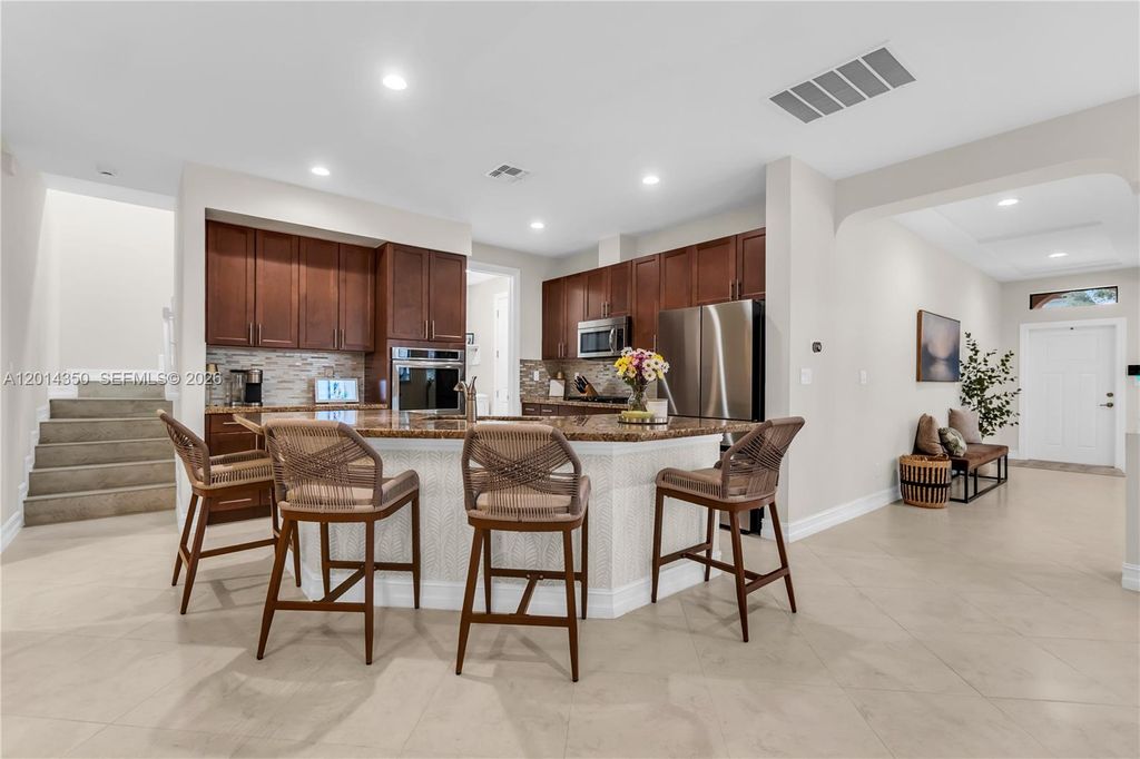 Photo of 8915 W Watercrest Cir W, Parkland, FL 33076 (MLS # A12014350)