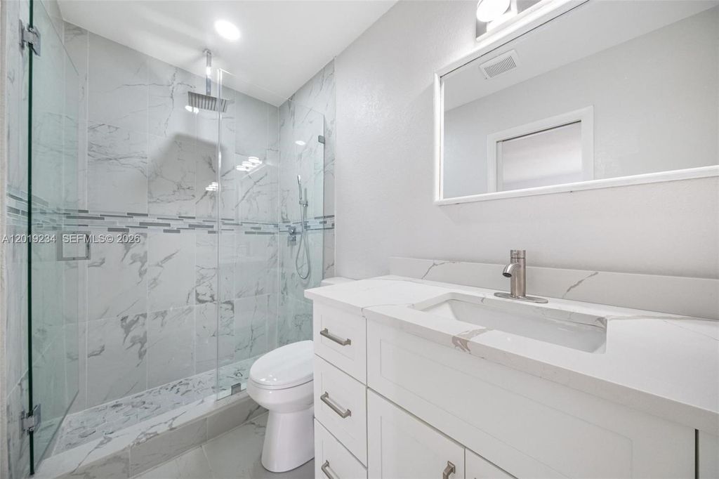 Photo of 3337 NW 23rd Ct, Lauderdale Lakes, FL 33311 (MLS # A12019234)