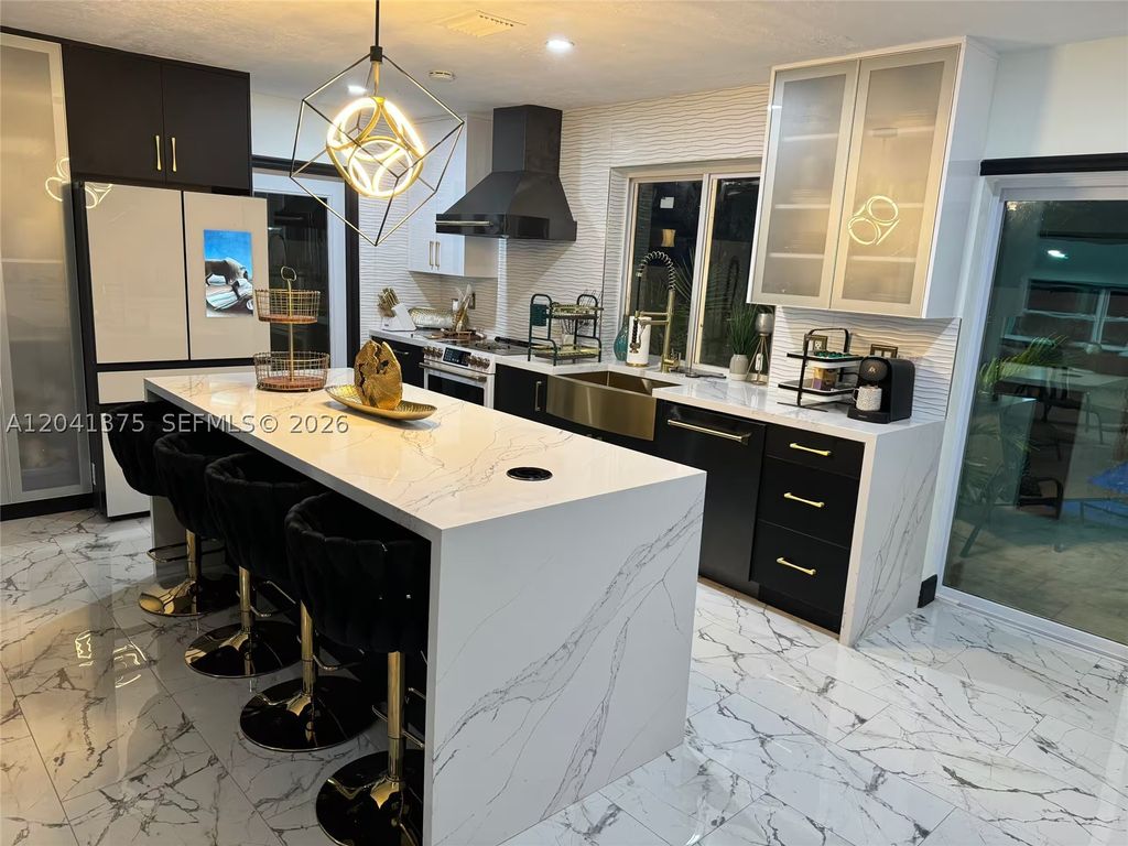 Photo of 6453 Meade St #1, Hollywood, FL 33024 (MLS # A12041375)