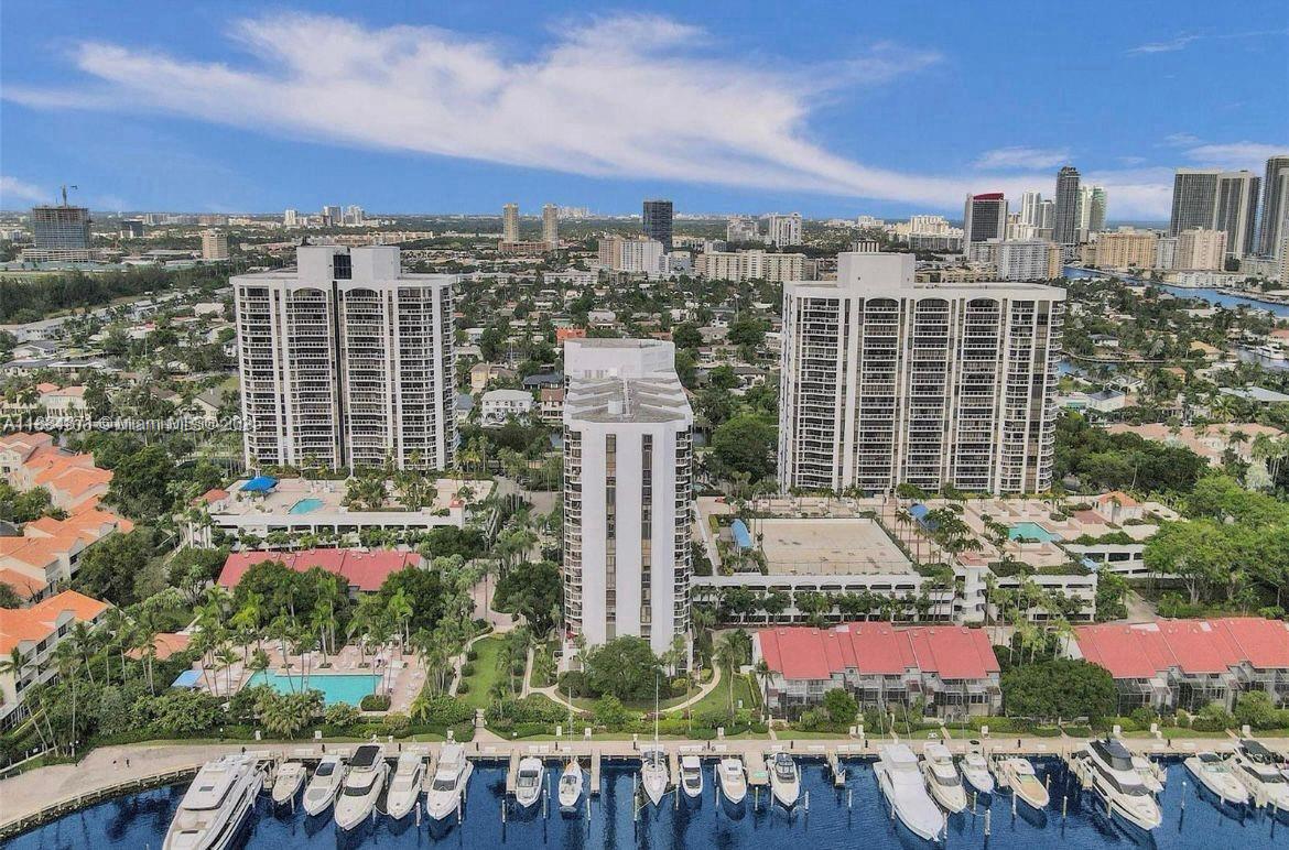 Rare Opportunity in Portsview Townhomes, Aventura! This spacious 2,396 sq. ft. residence offers stunning marina views from both the living room and primary suite. Features include updated bathrooms, closets, and a serene patio overlooking the water. Located in a secure gated community, residents enjoy heated pools, tennis courts, guest parking, and more. Just minutes from Aventura Mall, the beaches, dining, and entertainment. Potential boat dockage is available for rent or purchase at the community marina.