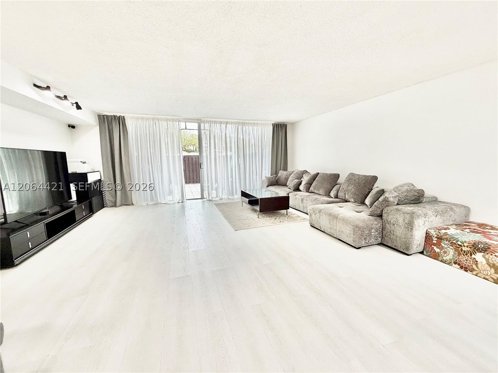 Photo of 2203 NE 7th St #14, Hallandale Beach, FL 33009 (MLS # A12064421)
