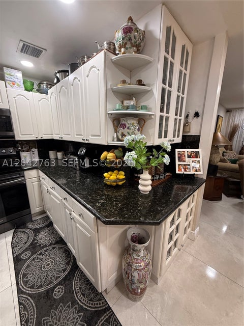 Photo of 4100 Crystal Lake Dr #111, Deerfield Beach, FL 33064 (MLS # A12042763)