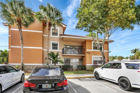 Photo of 8891 Wiles Rd #102, Coral Springs, FL 33067 (MLS # A11724304)
