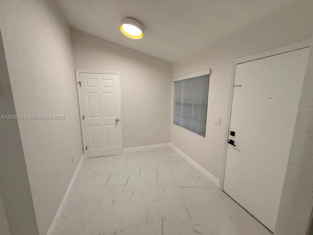 Photo of 1300 Wiley St #2, Hollywood, FL 33019 (MLS # A12016141)