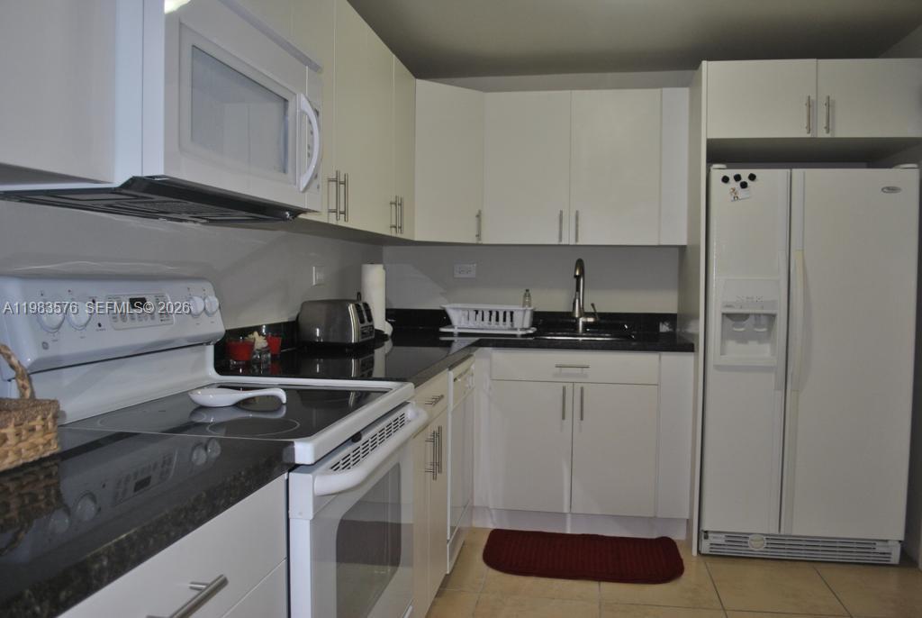 MAISON GRANDE CONDO - Residential Lease