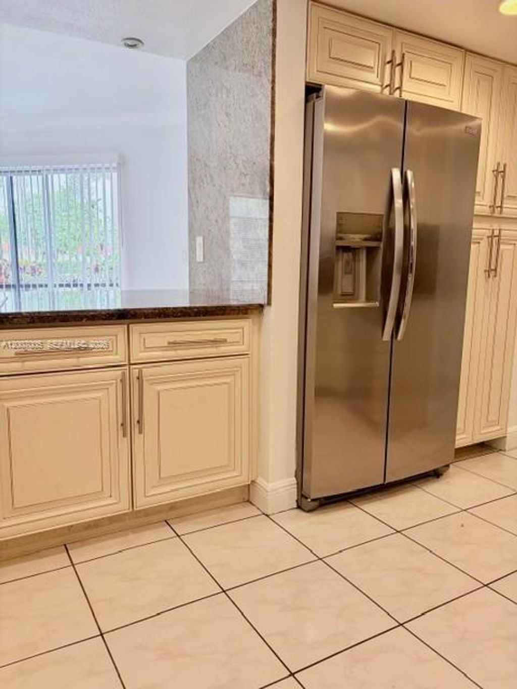 Photo of 3100 Riverside Dr #103, Coral Springs, FL 33065 (MLS # A12007005)