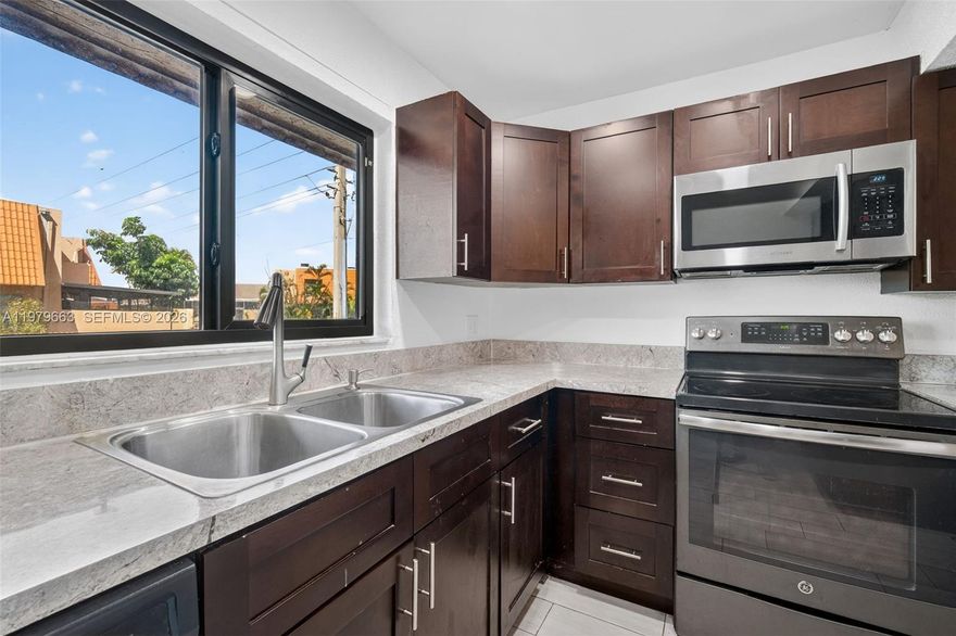 Beautiful corner townhouse with 4 bedrooms and 3 bathrooms in the desirable Westview community of Pembroke Pines. This spacious home features an open layout, a modern kitchen with stainless steel appliances, and elegant porcelain floors.
 One bedroom and a full bathroom on the first floor are great for guests. Enjoy lake views from the screened patio and extra outdoor storage. Conveniently located near shopping, dining, parks, hospitals, and major highways. 

The property is also available for lease! 
A credit score of 625 is required by the association.  Monthly HOA  $760 a Month + Special Assessment $217 a Month 

Vacant and easy to show!