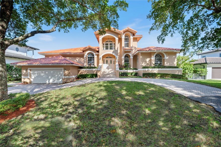 Stately and impressive executive residence set on an expansive 12,000 SF canal-front lot with a tranquil, picturesque backdrop. The elegant interior showcases soaring volume ceilings and exquisite marble and wood flooring throughout. Gracious formal living and dining rooms flow seamlessly into a stunning open family room, complemented by a gourmet kitchen and breakfast area—ideal for both everyday living and entertaining.

The expansive first-floor primary suite offers a private retreat, while all bedrooms enjoy beautiful water or garden vistas. Outdoors, an inviting open pool and newly rebuilt seawall (completed approximately three years ago) enhance the serene waterfront setting.

Designed for refined family living and grand-scale entertaining, this exceptional estate offers approximately 4,788 square feet of thoughtfully curated luxury. Ideally located within walking distance to the community park and Gulliver School, and surrounded by top-tier public and private schools. Minutes from Deering Bay Yacht & Country Club, as well as Chapman and Fairchild Tropical Gardens. Please refer to Broker Remarks for showing instructions.