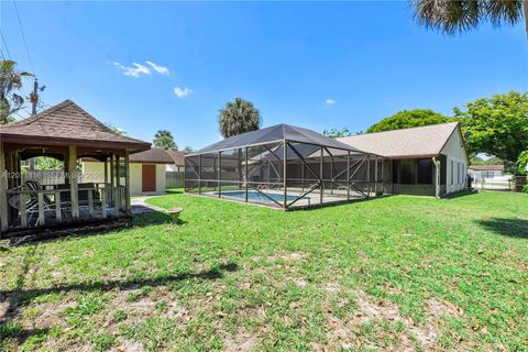 Tiny photo for 694 Dixie Ln, West Palm Beach, FL 33415 (MLS # A12011816)