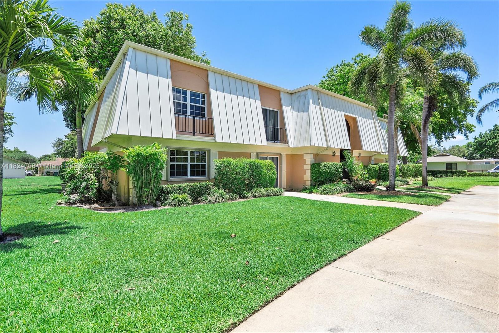Located in the heart of Davie, this spacious 2 bed, 2 bath condo offers 1,358 sq ft of comfortable living. The primary bedroom has direct access to a large screened-in balcony with peaceful waterfront views. Inside, you'll find wood kitchen cabinets and a mix of laminate, tile, and carpet flooring, plus a dedicated laundry room that could double as a home office. The unit features a NEW A/C (8/2024) and plenty of natural light. Ideal for college roommates, it's just minutes from local universities, shopping, and major highways. A perfect blend of convenience and comfort.
