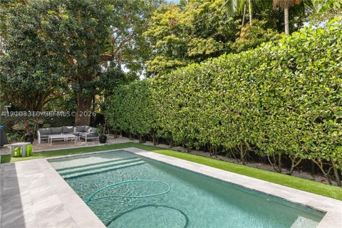 Photo of 11810 W Biscayne Canal Rd, Miami, FL 33161 (MLS # A12103310)