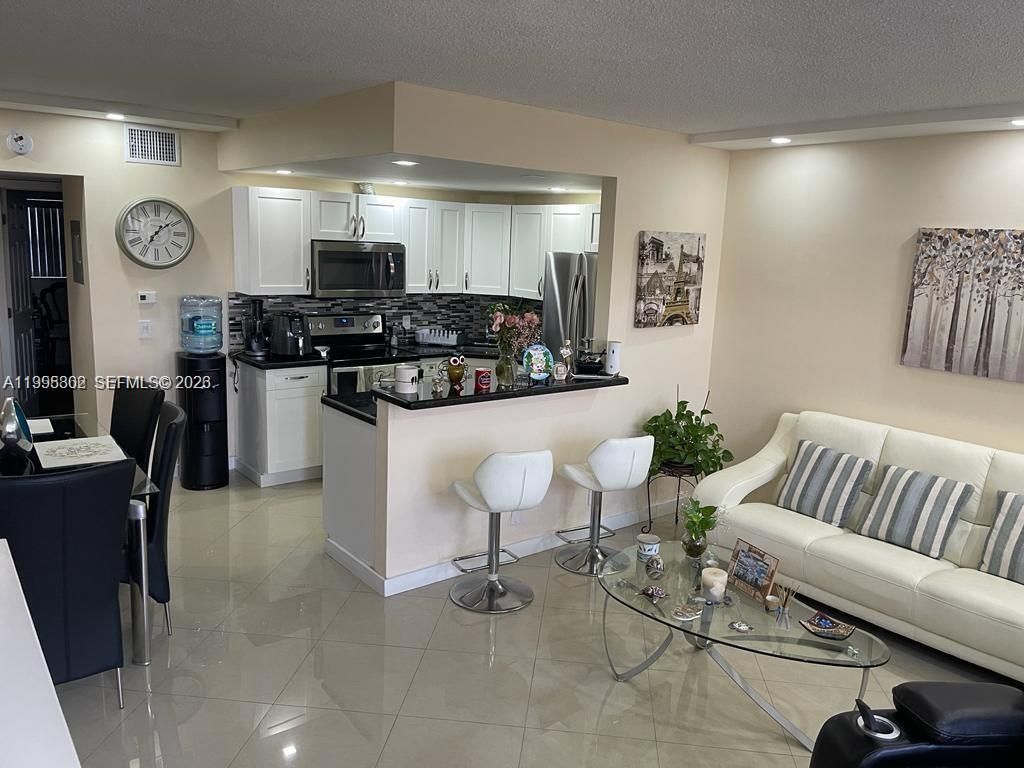 Photo of 3200 NE 7th Ct #306C, Pompano Beach, FL 33062 (MLS # A11995302)