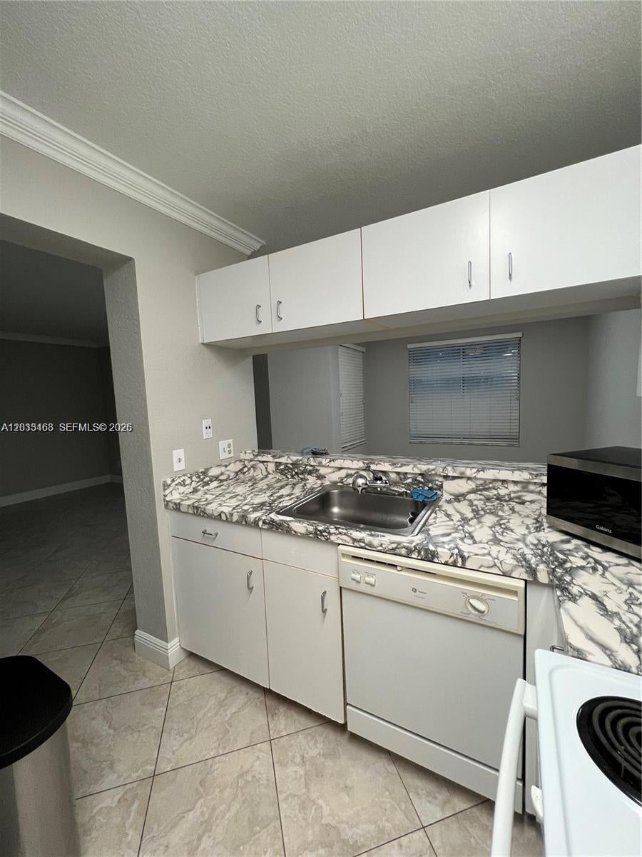 Photo of 1097 Coral Club Dr #1097, Coral Springs, FL 33071 (MLS # A12033468)