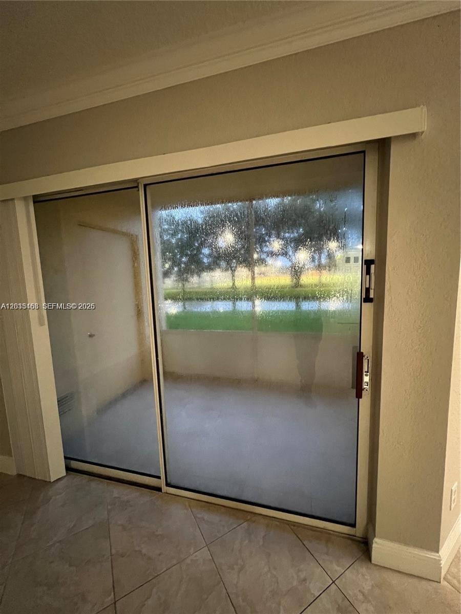 Photo of 1097 Coral Club Dr #1097, Coral Springs, FL 33071 (MLS # A12033468)