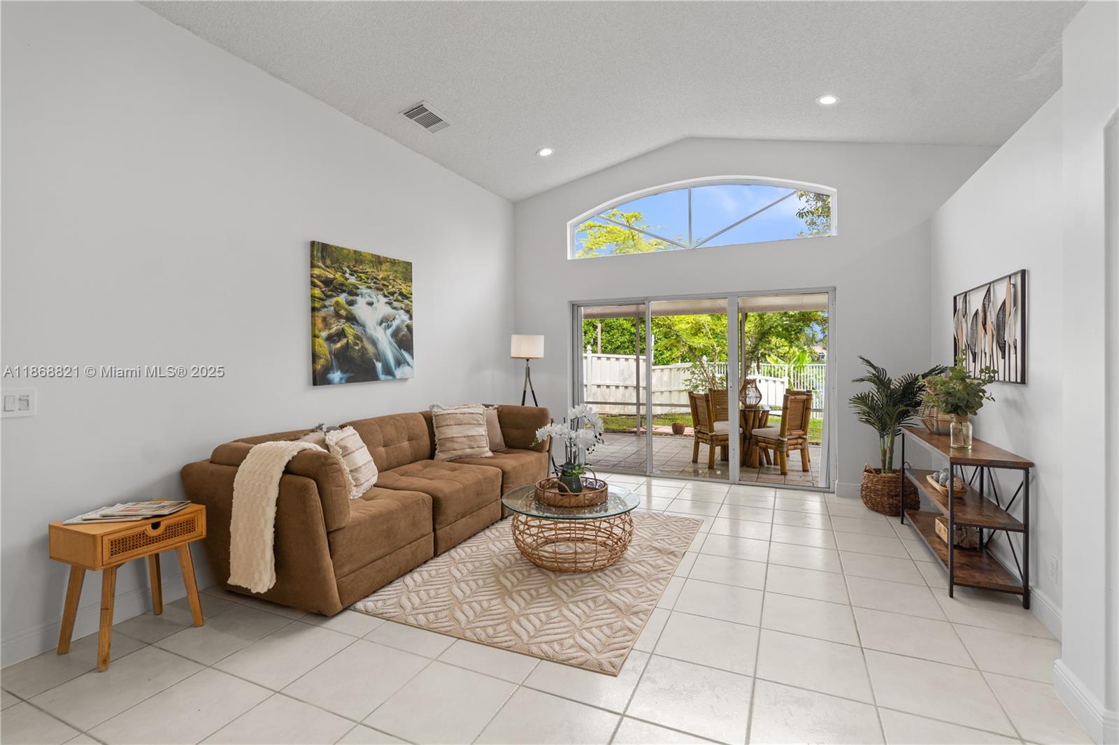 LAKEFRONT GEM!! OPEN & BRIGHT overlooking Lake Volume ceilings boast recessed lighting. NEW A/C, Cabinets & APPLIANCES. Freshly Painted. Oversized yard is newly fenced w/ access to lake. Numerous places of worship are nearby. Enjoy this gated community which offers the RARE ability to store your boat or RV. Will NOT disappoint!