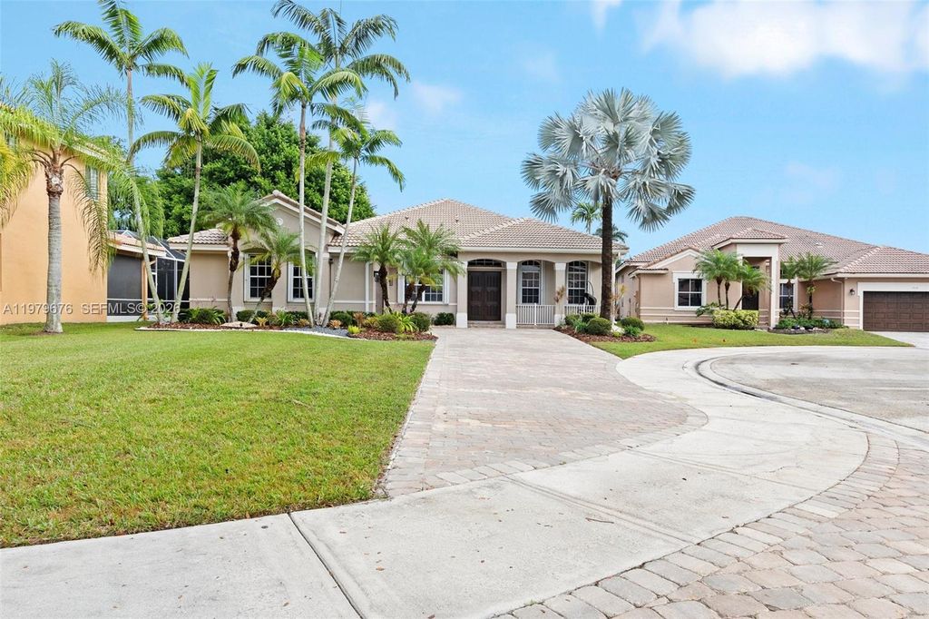 Photo of 1533 Cardinal Way, Weston, FL 33327 (MLS # A11979676)