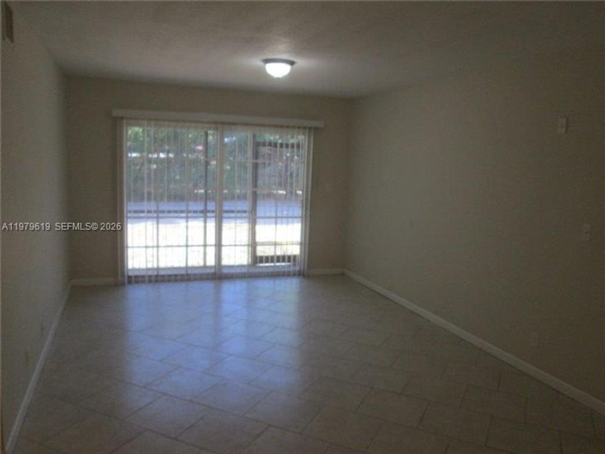 Attention Investors!! great opportunity!  Nice and spacious 1/1.5! already rented and great ROI!!.  NO RENTAL RESTRICTIONS. Low Maintenance fees, including water and trash collections. Tiled floors, washer and dryer inside unit and walking closet
