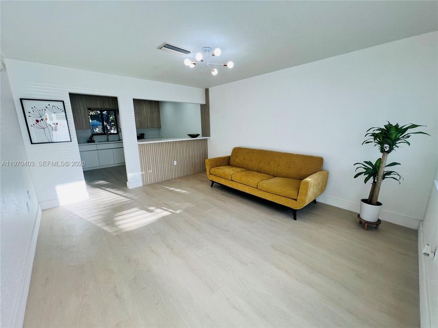 Beautiful fully renovated HALF DUPLEX with modern finishes throughout, move-in ready and thoughtfully updated. This residence features a fresh paint - in/out, newer shingle roof and brand-new doors and impact windows installed in February 2026, a 2023 A/C system, updated PVC plumbing completed a few years ago, an upgraded electrical panel with new exterior main, and fresh landscaping that enhances curb appeal. Conveniently located just minutes from Hard Rock Stadium, Aldi, Walmart, and major shopping centers, the property offers NO HOA and NO flood insurance required. NO FHA - Agents read broker remarks. Seller is offering $5,000 toward closing costs or a rate buy-down when using the preferred lender.