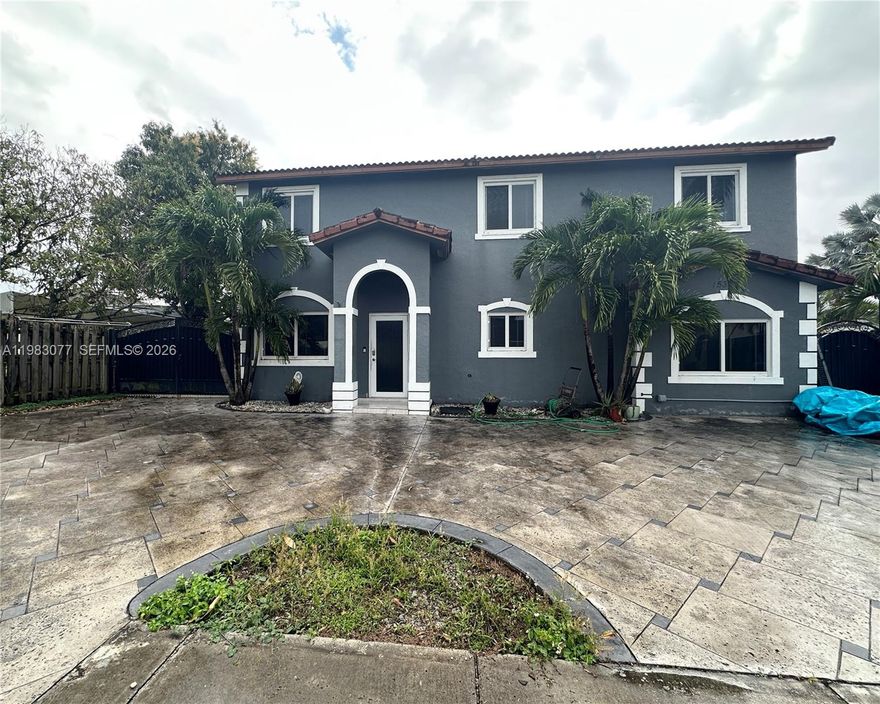 Beautiful 5 bed, 3 bath home in Richmond West offering 2,174 sqft of living space on a 6,873 sqft lot. This well-maintained property features tile flooring throughout, impact windows and doors, stainless steel appliances, and ample parking with gated side access for a boat and RV. This first floor includes one bedroom and full bathroom, ideal for guest, or in-laws quarters for additional income. The outdoor space is perfect for entertaining with a large patio, and located on a quiet cul-de-sac for added privacy and peace of mind. Make this home your own today