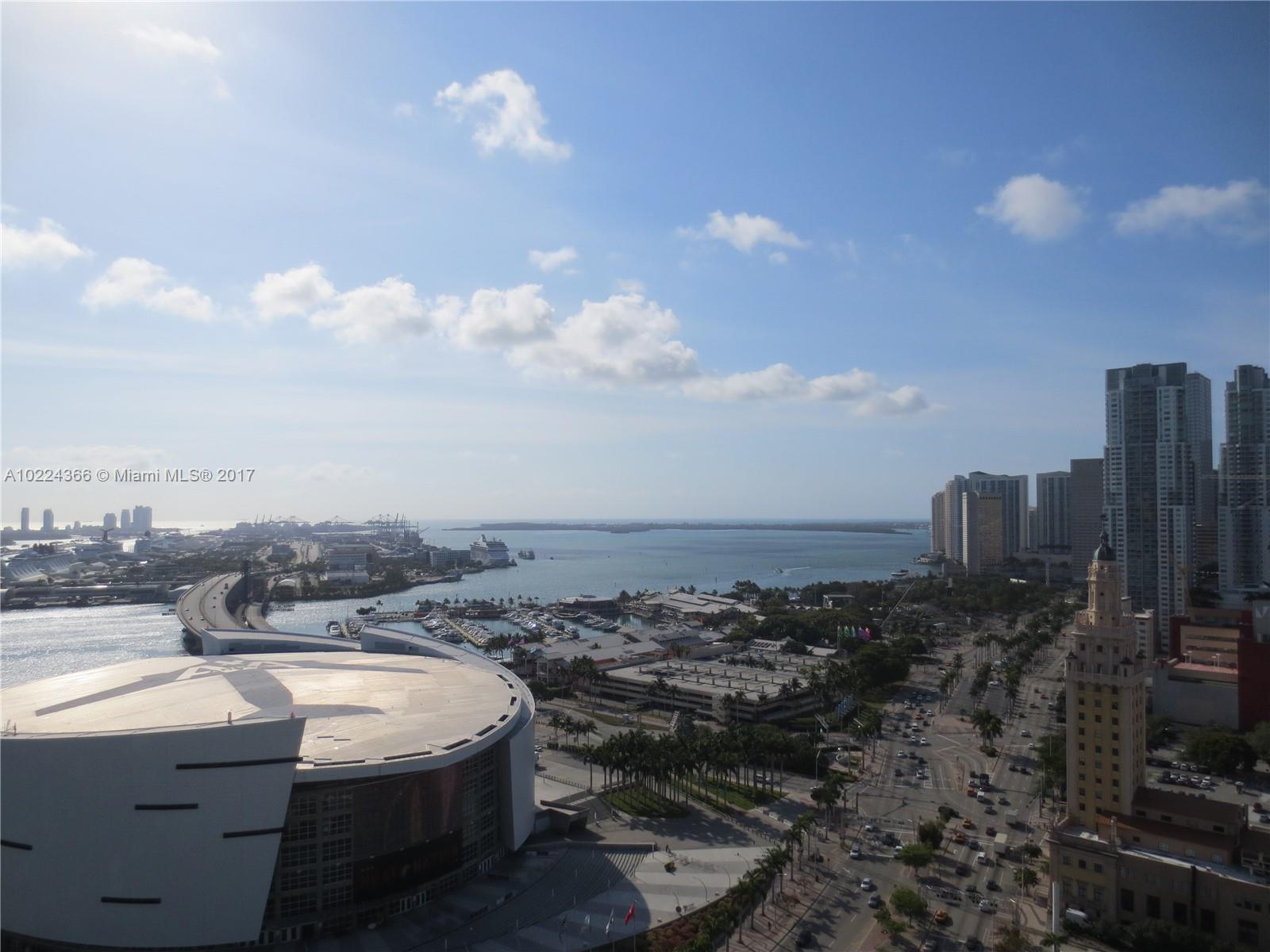 Beautiful 1/1.5 plus den unit, bay views, steps from American Airlines Arena! Must See!