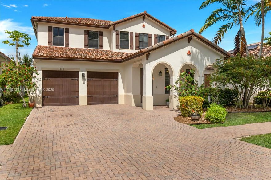 Welcome to Monterra at Cooper City, a prestigious 24-hour guard-gated community. This elegant home spans nearly 3000 sq ft and features high-impact windows throughout. The gourmet kitchen is a chef’s dream. A-rated schools serve the area, including elementary, middle, and high schools. The downstairs bedroom/den offers flexibility, while the laundry room and mini loft are conveniently located upstairs. Enjoy sports courts, dog parks, 3 playgrounds, a trail connecting amenities, a gigantic pool with a big kiddie splash pad, and a serene backyard with a lagoon-like canal. Experience luxury, safety, and top-tier education in one stunning location.