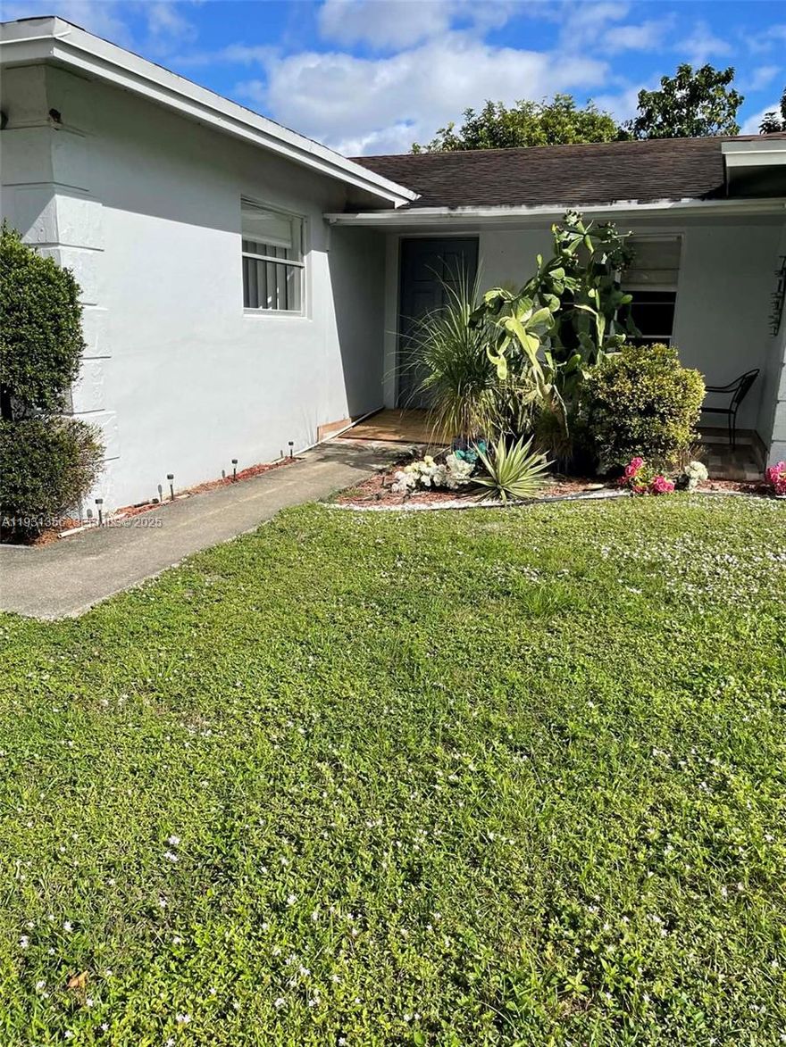 Nice 3 bedrooms + den! Bright and sunny modern kitchen with large eat-in-area. Beautiful redone bathrooms. Wood vinyl floors thru-out home! Converted garage for extra room. Fenced in yard. 
A rated Boca schools!