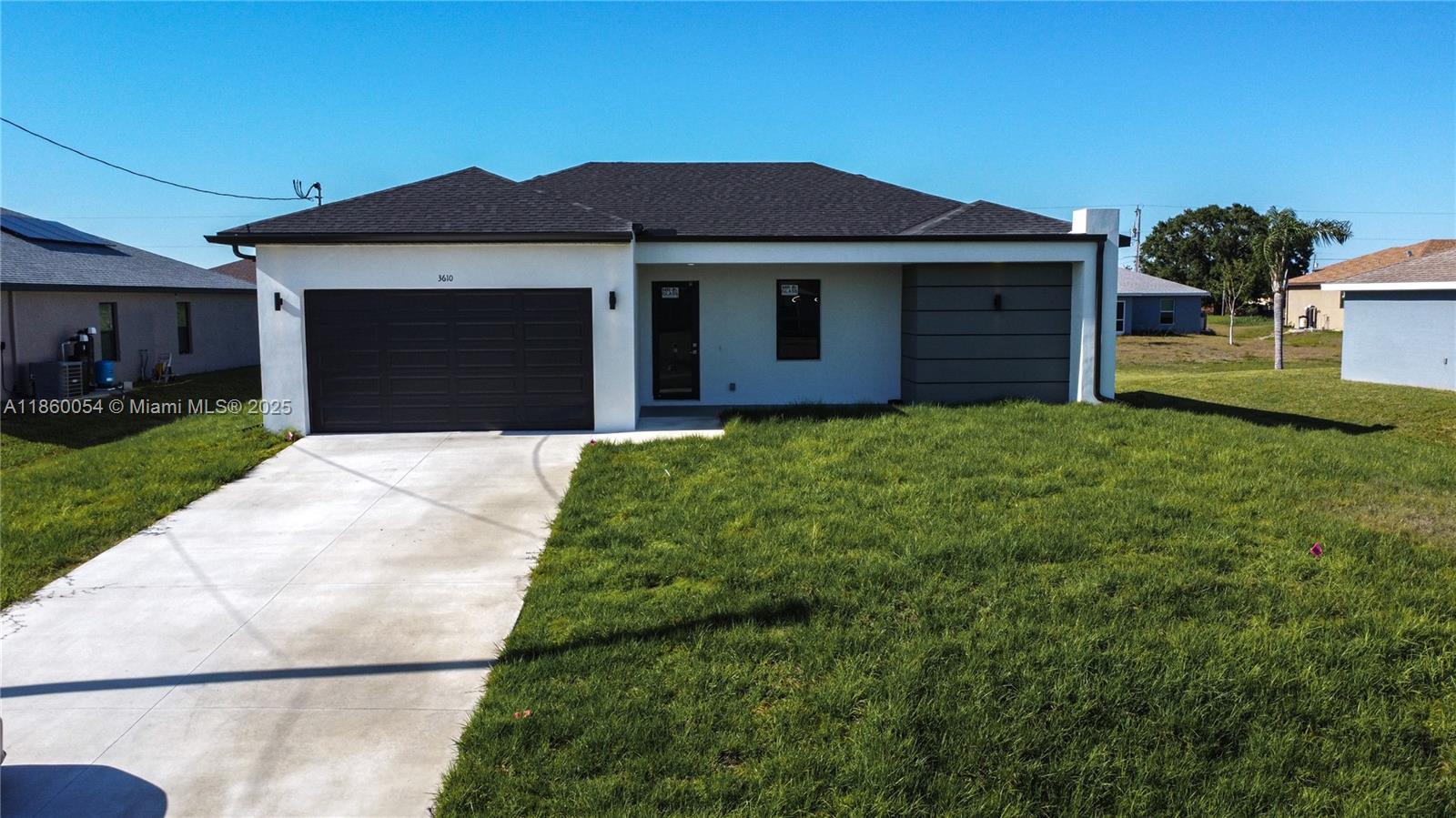 Welcome to 3610 22nd St SW, Lehigh Acres, FL 33976
Step into modern Florida living with this new 3-bed, 2.5-bath home built in 2025! Set on a spacious 10,585 sq ft lot with south-facing exposure, it offers bright interiors, sleek finishes, and a smart split-bedroom layout.
Enjoy ceramic tile throughout, 10-ft ceilings, impact windows, and an open kitchen with white cabinetry and electric cooktop. The master suite features dual sinks and a glass-enclosed shower.
Highlights include:
- Paved driveway & auto garage door
- Washer & dryer included
- Irrigation system
- 1-2-10 builder warranty
- No HOA!
Close to schools, shopping, and major roads—this move-in-ready home is perfect for families, professionals, or investors.
Schedule your showing today and make this Florida gem yours!