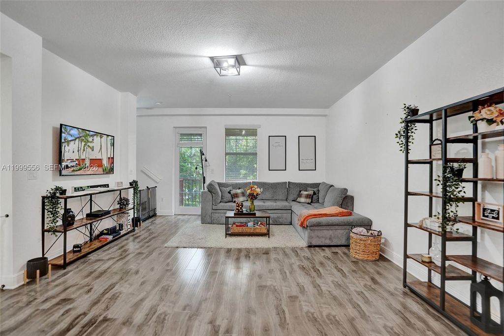 Photo of 11898 SW 25th Ct #103, Miramar, FL 33025 (MLS # A11999556)