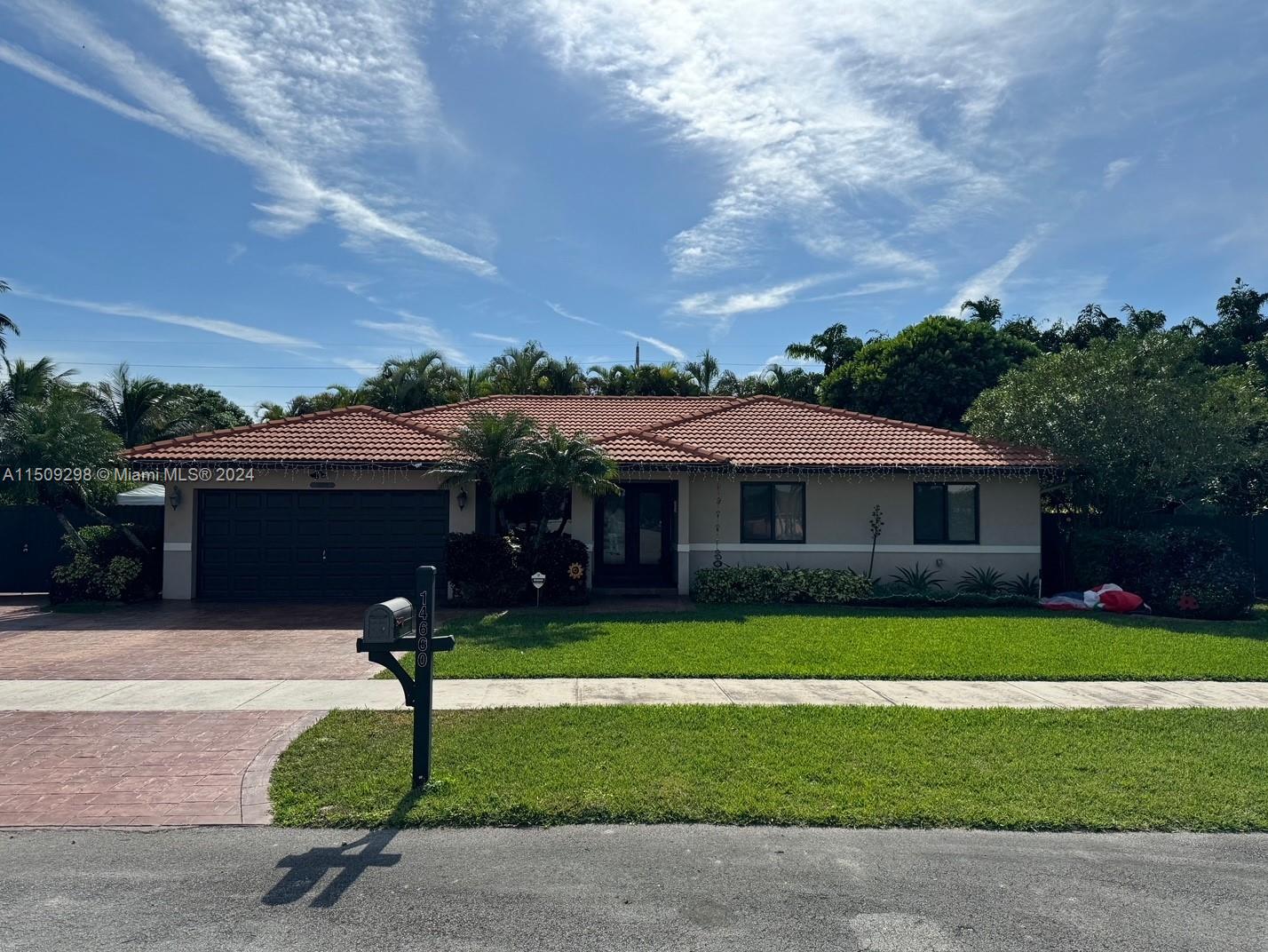 This modern/contemporary updated 4/2 13,000+SqFt home offers a very private serene tropical oasis backyard with a full size swimming pool with a gazebo. Enjoy your Florida summers in your own relaxing mini resort. Enough room for a Boat/RV as well as hosting family & friends over. This home offers impact doors and windows, including the two car garage door. This home has a formal dining room, separate living room and an open kitchen to the family room for entertaining. New A/C, pool pump and salt water system installed Less than two years ago. New attic insulation for increased energy efficiency installed a year ago. Three zone sprinkler system will keep your tropical oasis always green. A Must See!!!
